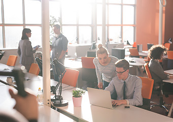 Image showing Two Business People Working With laptop in office