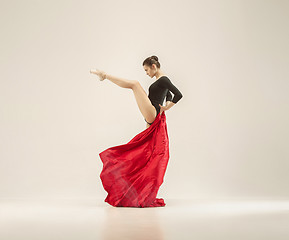 Image showing Modern ballet dancer dancing in full body on white studio background.