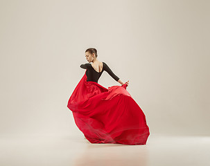 Image showing Modern ballet dancer dancing in full body on white studio background.