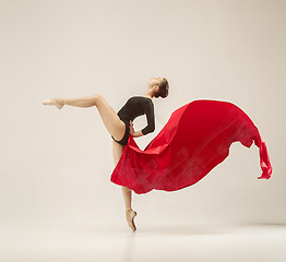 Image showing Modern ballet dancer dancing in full body on white studio background.