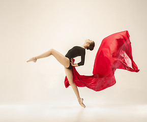 Image showing Modern ballet dancer dancing in full body on white studio background.