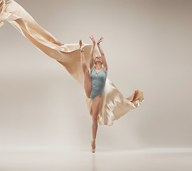 Image showing Modern ballet dancer dancing in full body on white studio background.