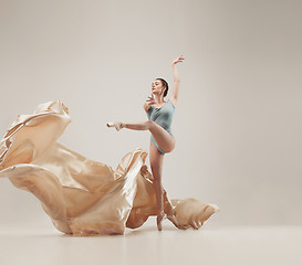 Image showing Modern ballet dancer dancing in full body on white studio background.