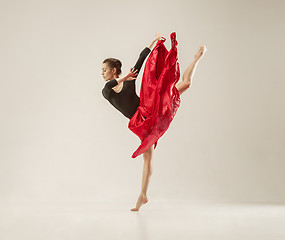 Image showing Modern ballet dancer dancing in full body on white studio background.