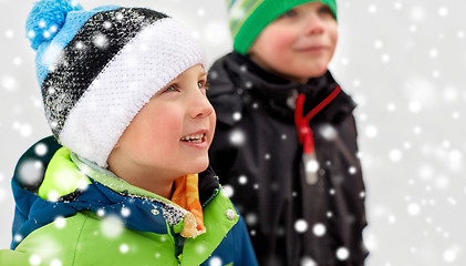 Image showing close up of little boys in winter clothes outdoors