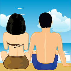 Image showing Man and woman sit on song on beach