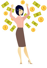 Image showing Happy busiess woman under money rain.