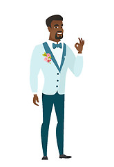 Image showing Smiling groom showing ok sign.