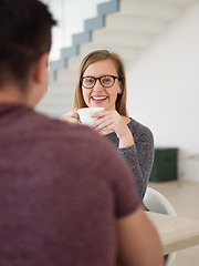 Image showing couple enjoying morning coffee and strawberries