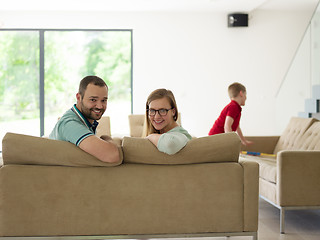 Image showing family with little boy enjoys in the modern living room