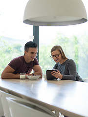 Image showing couple enjoying morning coffee and strawberries