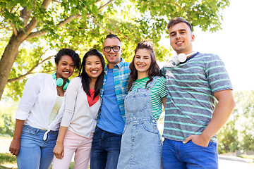 Image showing happy international friends in park