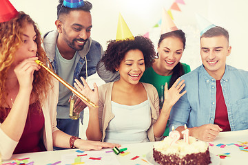 Image showing team greeting colleague at office birthday party