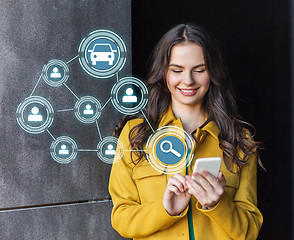 Image showing teenage girl using car sharing app on smartphone