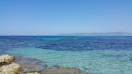 Image showing Beautiful sea views with boats and Palma de Mallorca on the hori