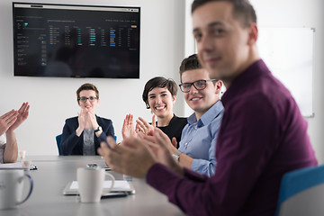 Image showing Group of young people meeting in startup office