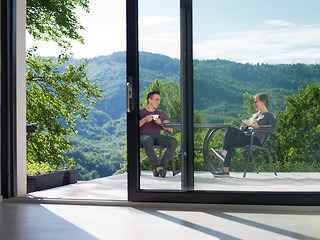 Image showing couple enjoying morning coffee and breakfast