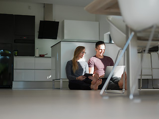 Image showing couple using tablet and laptop computers