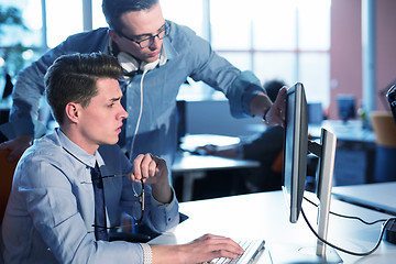 Image showing Two Business People Working With computer in office