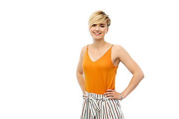 Image showing happy smiling young woman over white background