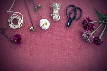 Image showing Florist workspace on dark purple canvas background