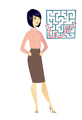 Image showing Business woman looking at labyrinth with solution