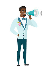 Image showing African-american groom talking into loudspeaker.