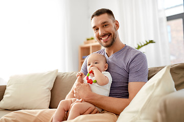 Image showing happy father with little baby daughter at home