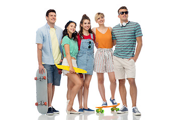 Image showing friends with skateboards over white background