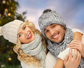 Image showing happy couple hugging over christmas tree