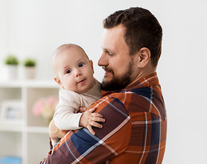 Image showing happy father with little baby boy at home
