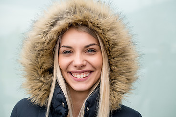 Image showing portrait of young blonde girl wearing winter jacket