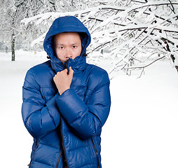 Image showing Sad Asian man in Blue