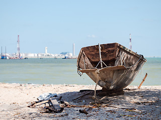 Image showing Old, abandoned fishing boat on the beach