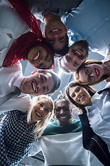 Image showing multiethnic Group of young business people celebrating success