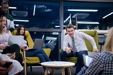 Image showing Multiethnic startup business team having meeting