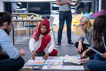 Image showing black muslim woman having meeting with Multiethnic  startup busi