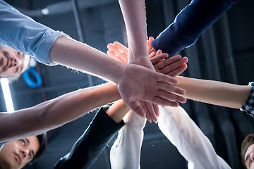 Image showing multiethnic Group of young business people celebrating success