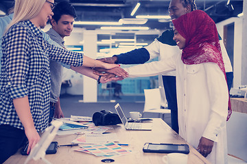 Image showing multiethnic Group of young business people celebrating success