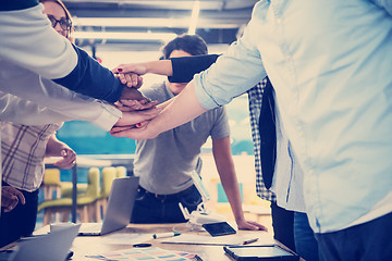 Image showing multiethnic Group of young business people celebrating success