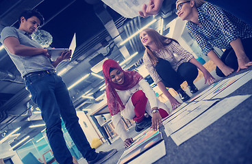 Image showing black muslim woman having meeting with Multiethnic  startup busi