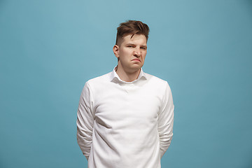 Image showing Beautiful bored man isolated on studio background