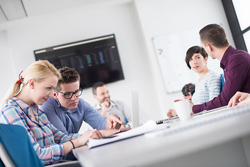 Image showing Two Business People Working With laptop in office