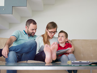 Image showing family with little boy enjoys in the modern living room