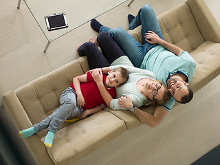 Image showing family with little boy enjoys in the modern living room