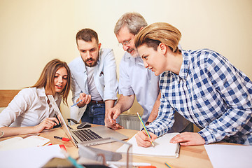 Image showing Team job. Photo young businessmans working with new project in office