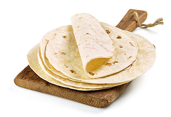 Image showing empty tortillas on wooden cutting board