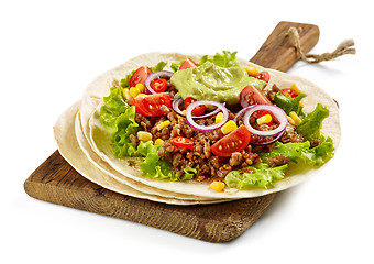 Image showing Tortilla wrap with fried minced meat and vegetables