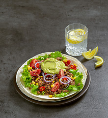 Image showing Tortilla wrap with fried minced meat and vegetables