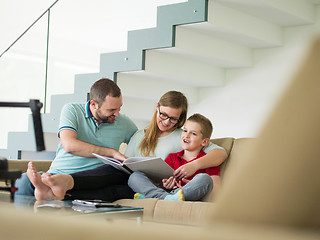 Image showing family with little boy enjoys in the modern living room